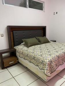 Postel nebo postele na pokoji v ubytování DEPARTAMENTOS ANAHUAC