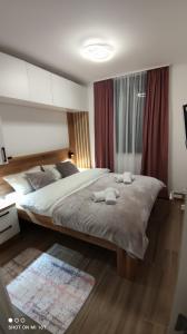 Postel nebo postele na pokoji v ubytování Apartman Danica