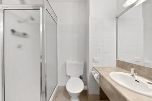 Koupelna v ubytování Allurity Hotel