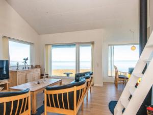 a living room with a view of the ocean at 6 person holiday home in Harboøre-By Traum in Harboør