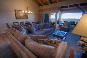 a living room with a couch and a table at Sky Lake Splendor condo in South Lake Tahoe