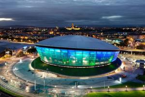 a large building in a city at night at The Hydro Escape - 5* Event Venue *Free Parking* in Glasgow