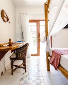 Katil atau katil-katil dalam bilik di Pousada Paraiso dos Ventos Preá