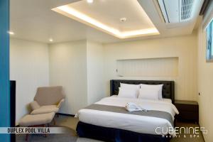 Letto o letti in una camera di Cube9 Resort & Spa 큐브9 리조트 & 스파