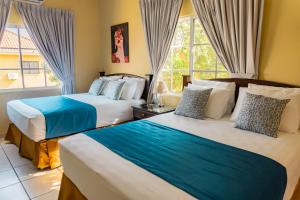 Voodi või voodid majutusasutuse Art Hotel Boutique toas