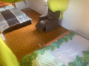 Postel nebo postele na pokoji v ubytování Citron vert