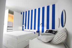 Ένα ή περισσότερα κρεβάτια σε δωμάτιο στο Santa Cesarea Terme B&B