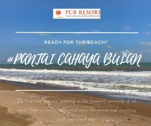 哥打巴鲁PCB BEACH RESORT的海滩上写着海滩的文字