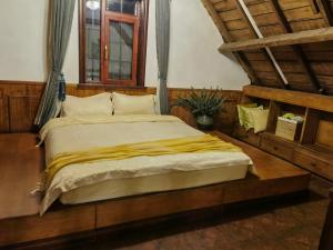 Voodi või voodid majutusasutuse Nordic Memory in Qingdao toas
