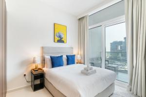 Postel nebo postele na pokoji v ubytování Reva Residences with Canal View - 1BR Apartment - Allsopp&Allsopp