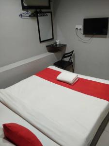 Postel nebo postele na pokoji v ubytování HOTEL AVATARR