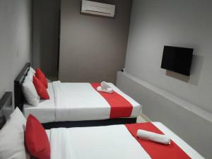Postel nebo postele na pokoji v ubytování HOTEL AVATARR