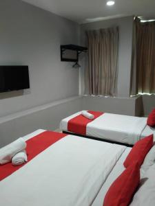 Postel nebo postele na pokoji v ubytování HOTEL AVATARR