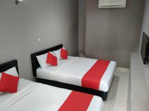 Postel nebo postele na pokoji v ubytování HOTEL AVATARR