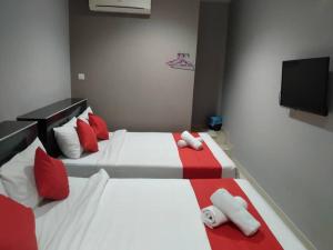 Postel nebo postele na pokoji v ubytování HOTEL AVATARR