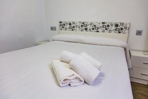 A bed or beds in a room at Apartment Triana