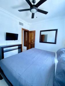 Postel nebo postele na pokoji v ubytování Penthouse a pasos de las hermosas playas de Bávaro