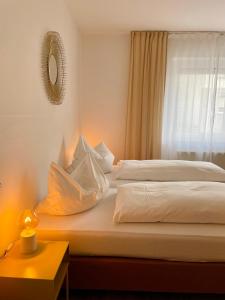 Letto o letti in una camera di Hotel Berg