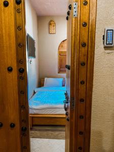 Letto o letti in una camera di Alaqur View Inn نزل واجهة العقر