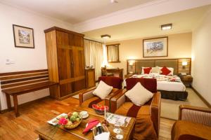 Ένα ή περισσότερα κρεβάτια σε δωμάτιο στο Atithi Resort & Spa