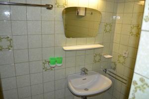 a bathroom with a sink and a mirror at Appartementhaus Anny in Vent +43 photos