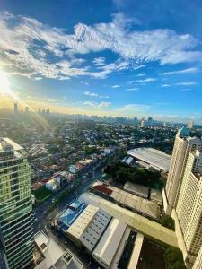 an aerial view of a city with buildings at AFFORDABLE StayCation EASTWOOD CITY in Manila