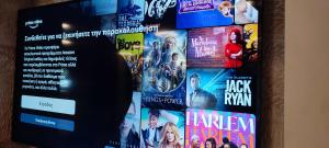 TV a/nebo společenská místnost v ubytování Poseidonio