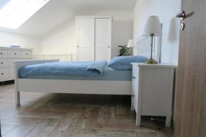 Postel nebo postele na pokoji v ubytování Apartmán U Josefa