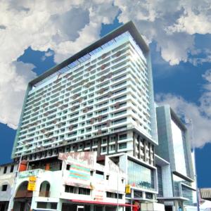a tall building with many windows on the side of it at Melaka The Straits Residence in Melaka