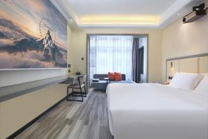 Postel nebo postele na pokoji v ubytování Wing Hotel Guilin - Central Square