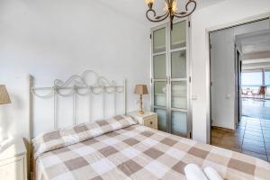 Posteľ alebo postele v izbe v ubytovaní Puerto Denia
