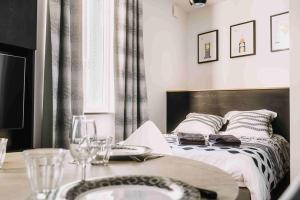 Posteľ alebo postele v izbe v ubytovaní Nouveau studio grand luxe proximité siège Michelin