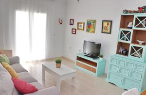 TV a/nebo společenská místnost v ubytování Apartamento La Fuente