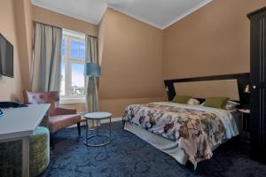 Postel nebo postele na pokoji v ubytování Home Hotel Gabelshus