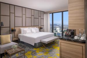 Melia Vinpearl Thanh Hoa客房内的一张或多张床位