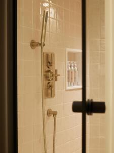 a shower in a bathroom with a glass door at No 42 by GuestHouse, Margate in Margate