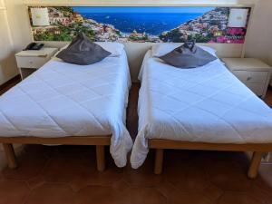 Postel nebo postele na pokoji v ubytování Hotel Montecarlo