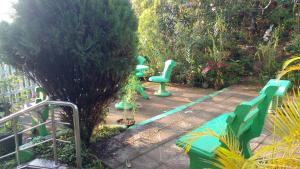 Jardín al aire libre en Tree Cool Resort
