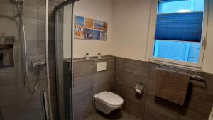 Koupelna v ubytování Ferienwohnung Meiringen + 10 fotografií