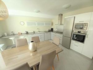 A kitchen or kitchenette at Miraflores Beachfront Penthouse