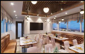 An Phu Ha Long Villa tesisinde bir restoran veya yemek mekanı