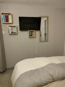 מיטה או מיטות בחדר ב-jujuouragan