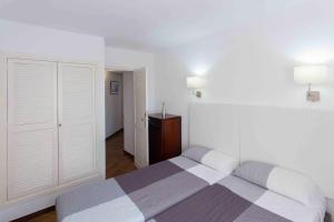 Posteľ alebo postele v izbe v ubytovaní PRIMERISIMA LINEA DE MAR. HUTG 038644-53