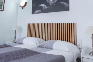 Posteľ alebo postele v izbe v ubytovaní PRIMERISIMA LINEA DE MAR. HUTG 038644-53