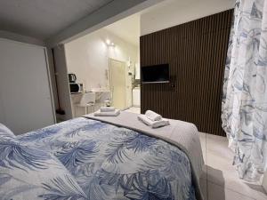 Ένα ή περισσότερα κρεβάτια σε δωμάτιο στο Tiny & Cosy Studio Flat in Como
