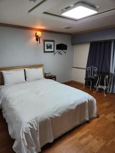 Postel nebo postele na pokoji v ubytování Hani Motel