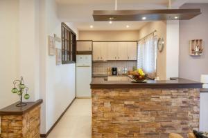 A kitchen or kitchenette at Villa Red Porto Cheli