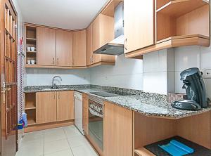 Kuchyň nebo kuchyňský kout v ubytování Picasso Suites