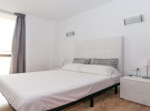 Postel nebo postele na pokoji v ubytování Picasso Suites