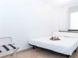 Postel nebo postele na pokoji v ubytování Picasso Suites
